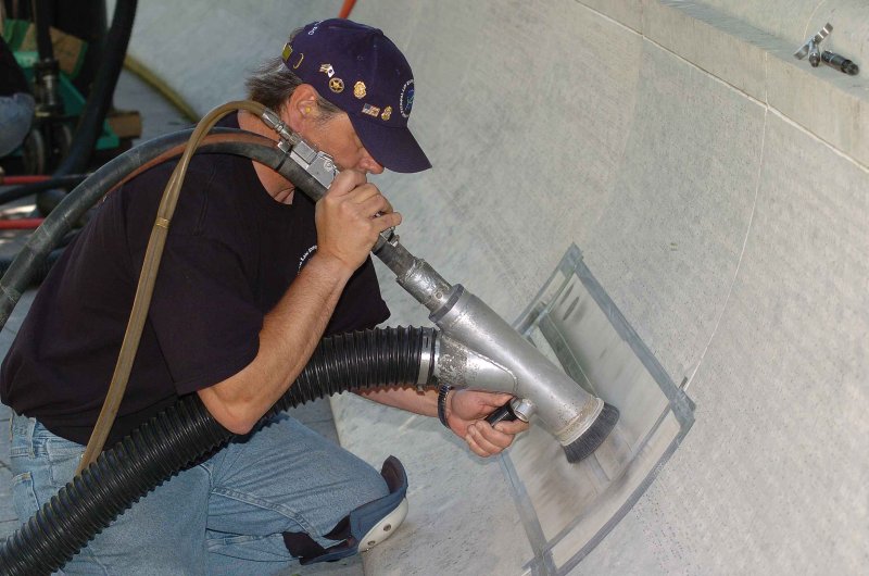 Man working on wall
