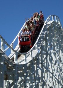 CONWIP go round with different parts like roller coaster seats with people