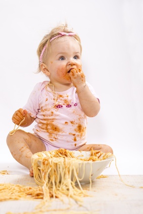 Girl eating Spaghetti