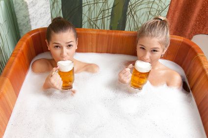 Women in Tub with Beer