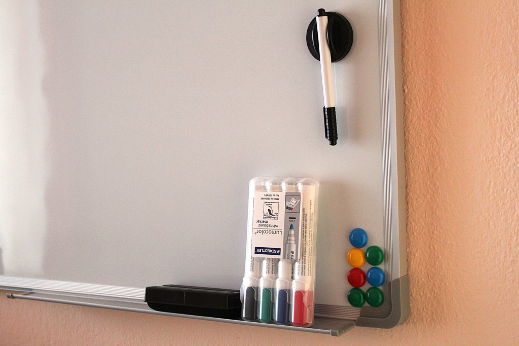 Whiteboard markers, eraser, and magnets