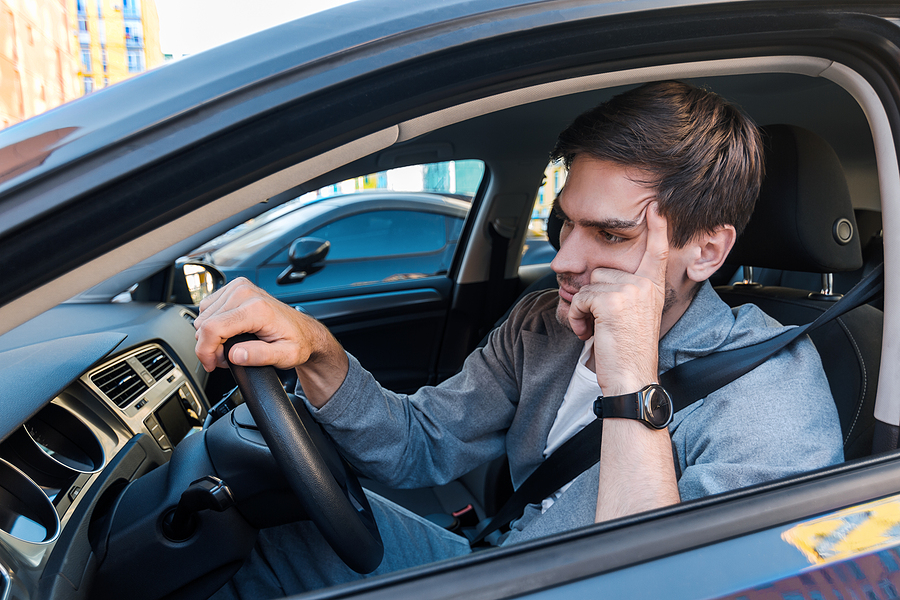 Annoyed Tired Young Man in Traffic