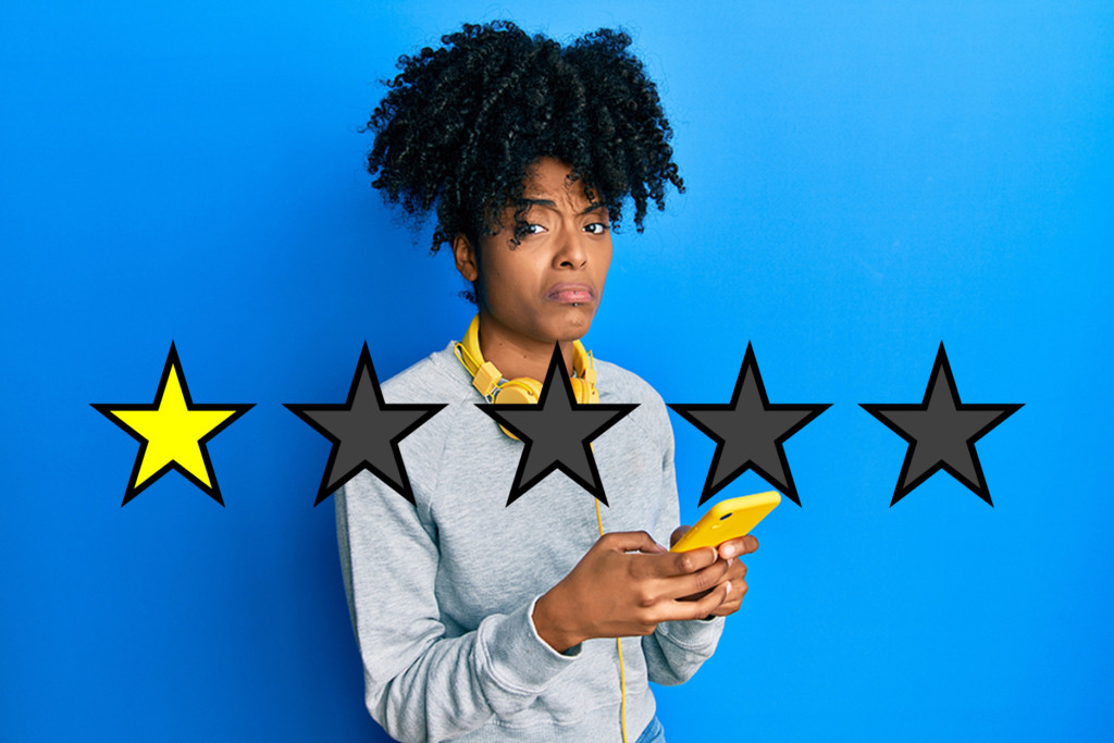 Unhappy Woman with Mobile Phone One Star Rating